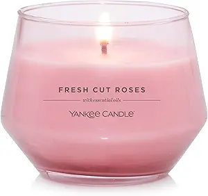 An image of the Yankee Candle Fresh Cut Roses, a pink candle in a stylish glass container, exuding a delicate floral fragrance. no-save