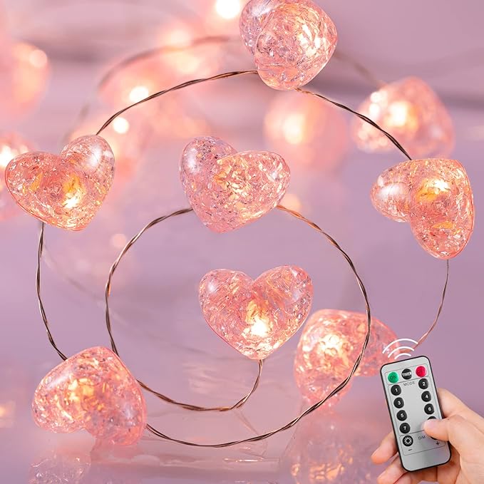 Valentine’s Day pink fairy string lights with heart-shaped bulbs, creating a romantic and whimsical ambiance, perfect for cozy home decor or special occasions. no-save