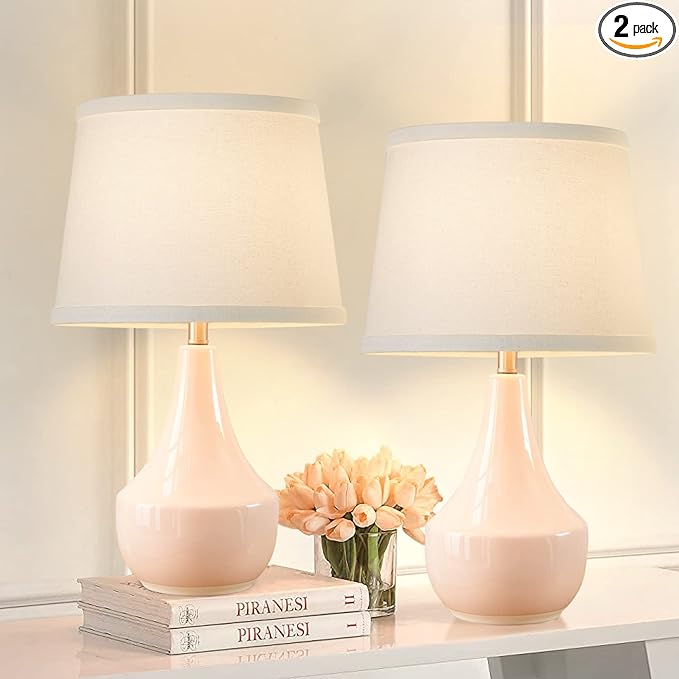 Set of two elegant GyroVu ceramic table lamps with pink bases and white lampshades, ideal for adding a soft and sophisticated glow to your bedroom or living space. no-save