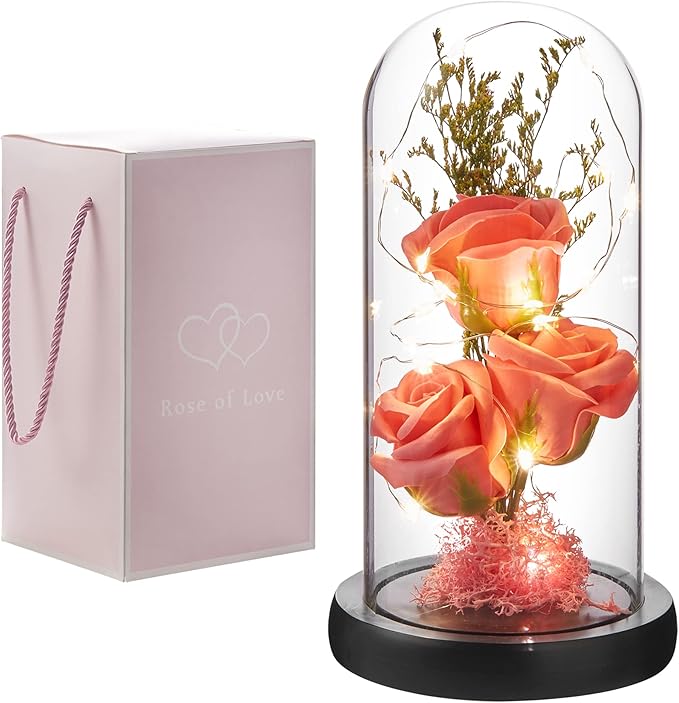 A delicate preserved rose in a glass dome with soft lighting, perfect as a timeless and romantic home decor centerpiece. no-save